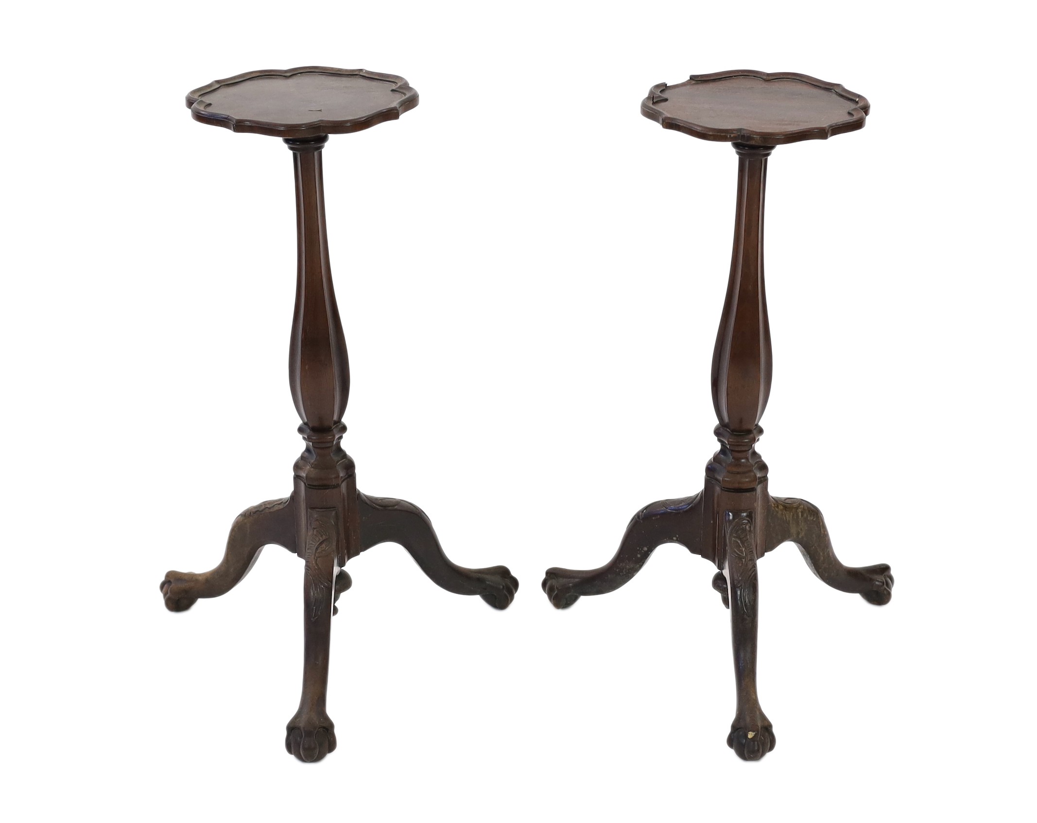 A pair of 18th century Dutch mahogany and oak torchere stands, width of tops 24cm height 69cm